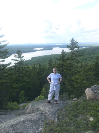 Shayla Miller on a mountain top